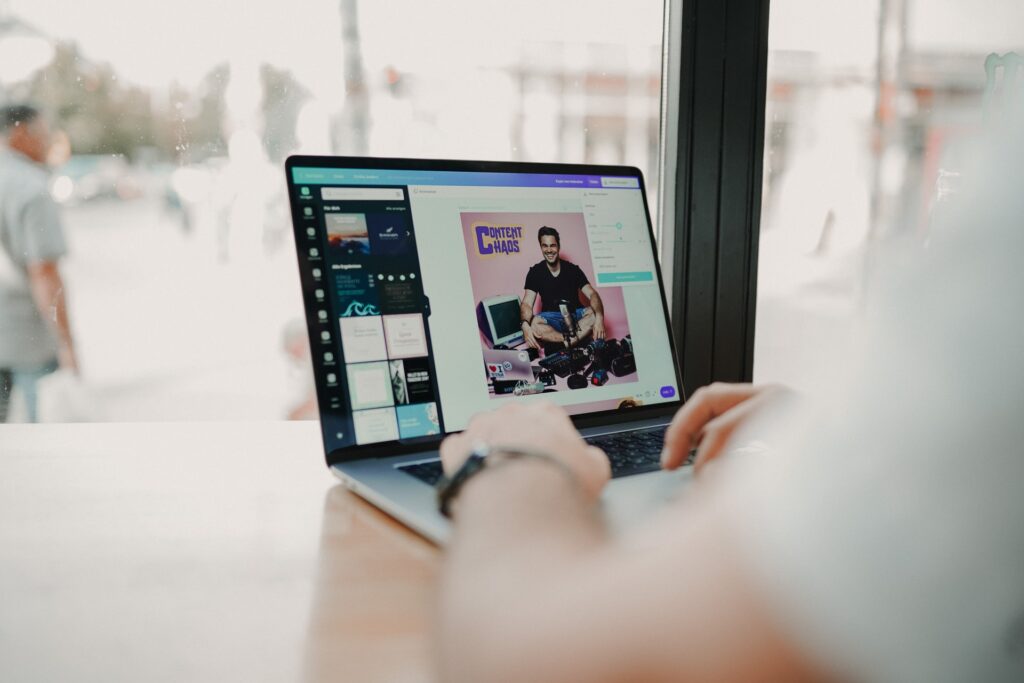 the screen of a computer showing a cover image being created in Canva for a content creation podcast