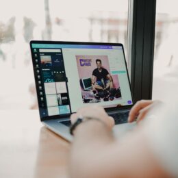the screen of a computer showing a cover image being created in Canva for a content creation podcast